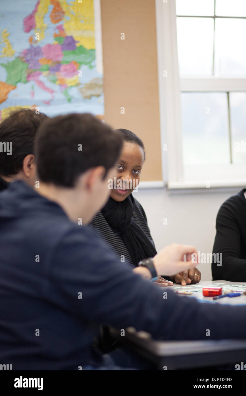 adults in a further education college studying EFL, English as a Foreign Language Stock Photo