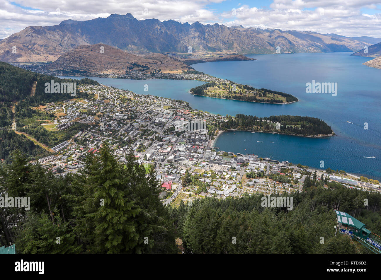 Queenstown and Lake Wakatipu from the restaurant on Ben Lomond mountain Skyline gondola.The Remarkables in background. New Zealand South Island Stock Photo