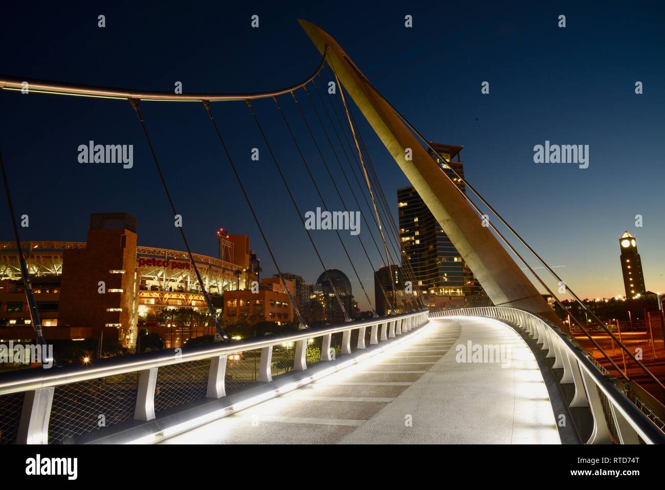 The iconic, modern 500feet long Harbor Drive Pedestrian Bridge at sunrise, connects Petco Park
