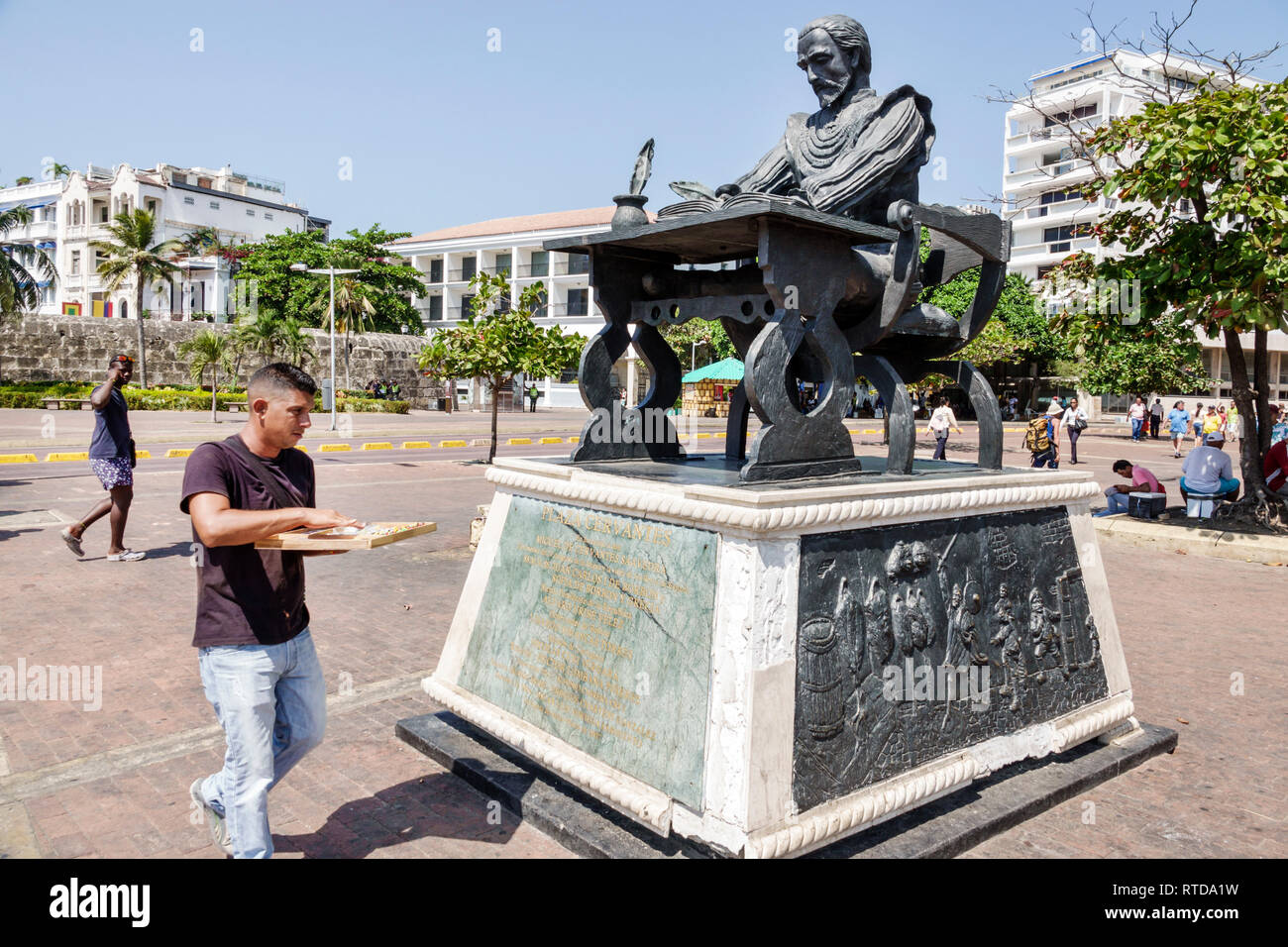 Cartagena Colombia,Hispanic resident residents,Plaza Cervantes,statue,sculpture,Miguel de Cervantes Saavedra by Hector Lombana,man men male,COL1901190 Stock Photo