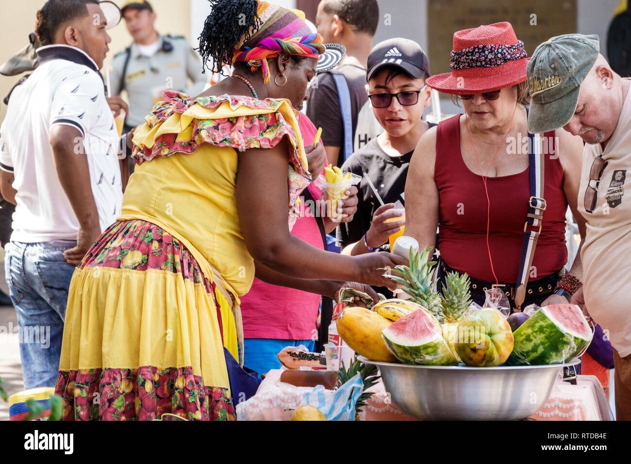 Cartagena Colombia,Plaza San Pedro Claver,Black Afro Caribbean Palenqueras,woman female women,fruit vendor,traditional costume,cultural heritage symbo Stock Photo
