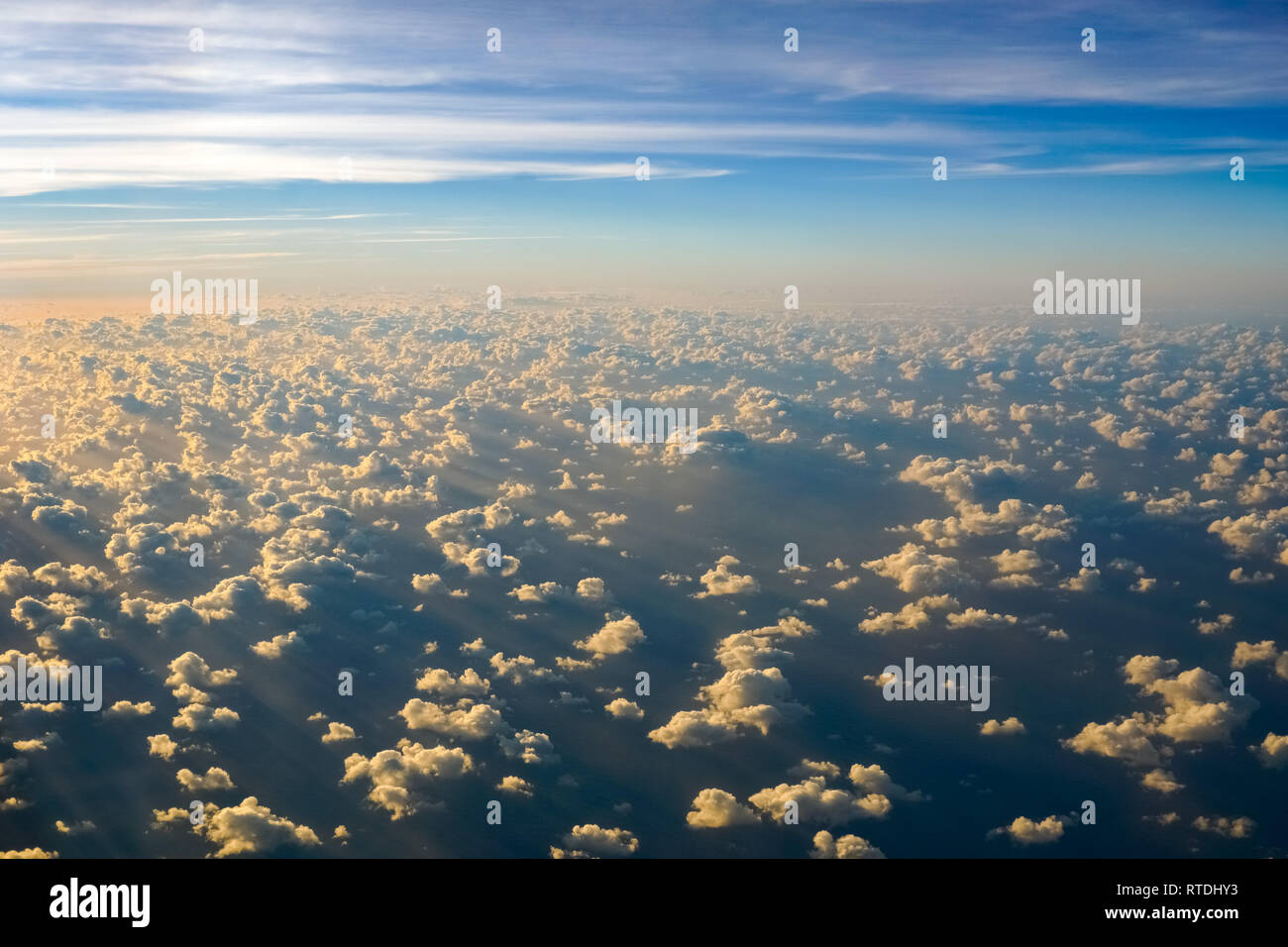 Aerial view of a cloudy sunset while flying above the clouds., Maui ...