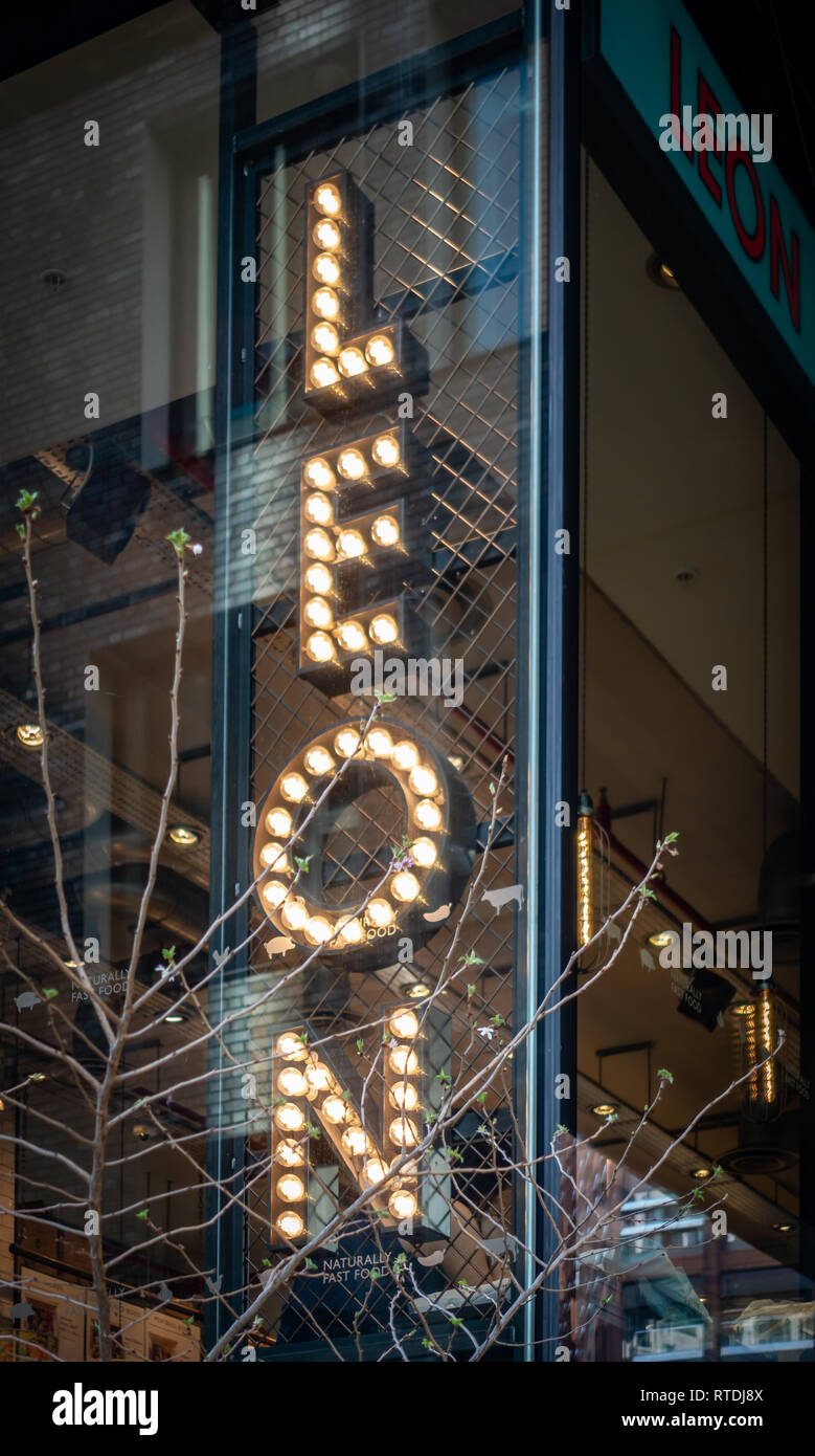 Lit Bulbs make the name Leon, a naturally fast food outlet of a  health-conscious counter-serve chain taking inspiration from around the  Mediterranean Stock Photo - Alamy