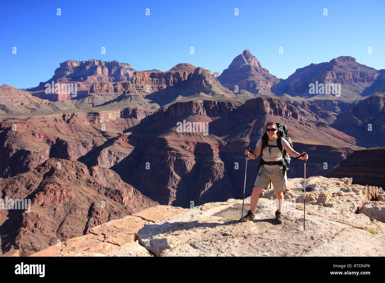 Young woman backpacker on the Tonto Trail in Grand Canyon National Park, Arizona. Stock Photo