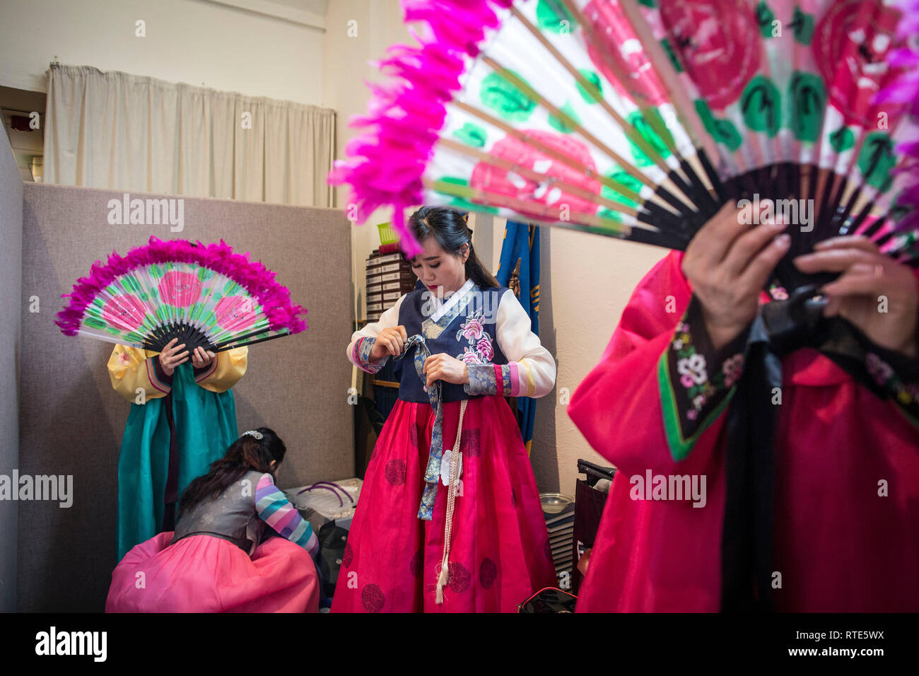 London, UK. 1st March 2019. Korean Ladies prepare to perform the traditional Buchaechum also known as the Fan Dance on the day Korea Commemorates 100th Anniversary of March 1st Independence Movement at New Malden Methodist Church, London, England, UK The historic remembrances have implications for modern-day relations between the two Koreas, and with Japan. On Friday North and South Koreans in New Malden commemorate the 100th anniversary of the March 1st Movement, a mass demonstration of Korean resistance against Japanese colonial rule. Credit: Jeff Gilbert/Alamy Live News Stock Photo