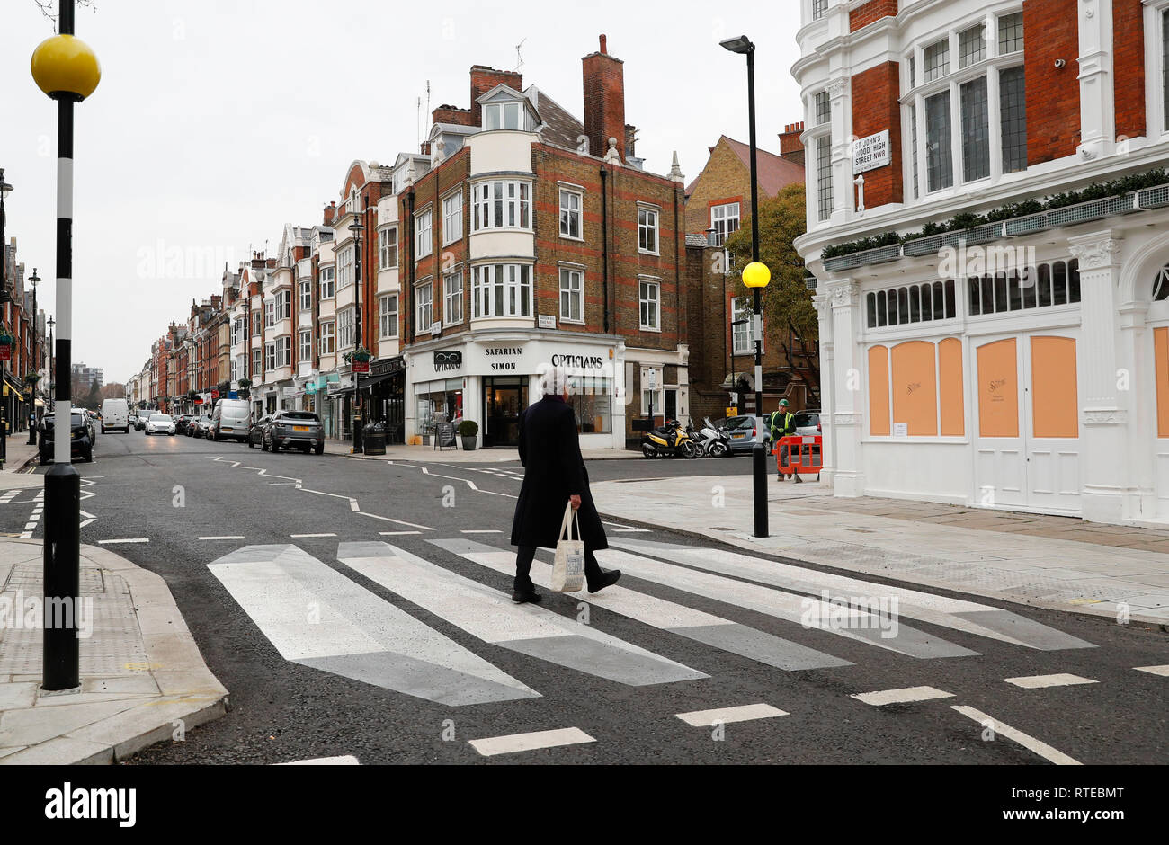 London, UK.1st March, 2019. A 3D zebra crossing is seen in St. John's Wood High Street in London, Britain, on March 1, 2019. According to BBC, the UK's first 3D zebra crossing has been painted on a north-west London road in a bid to slow down the traffic. The optical illusion, which creates a floating effect, has been introduced in St John's Wood by Westminster City Council as part of a 12-month trial. Credit: Han Yan/Xinhua/Alamy Live News Stock Photo