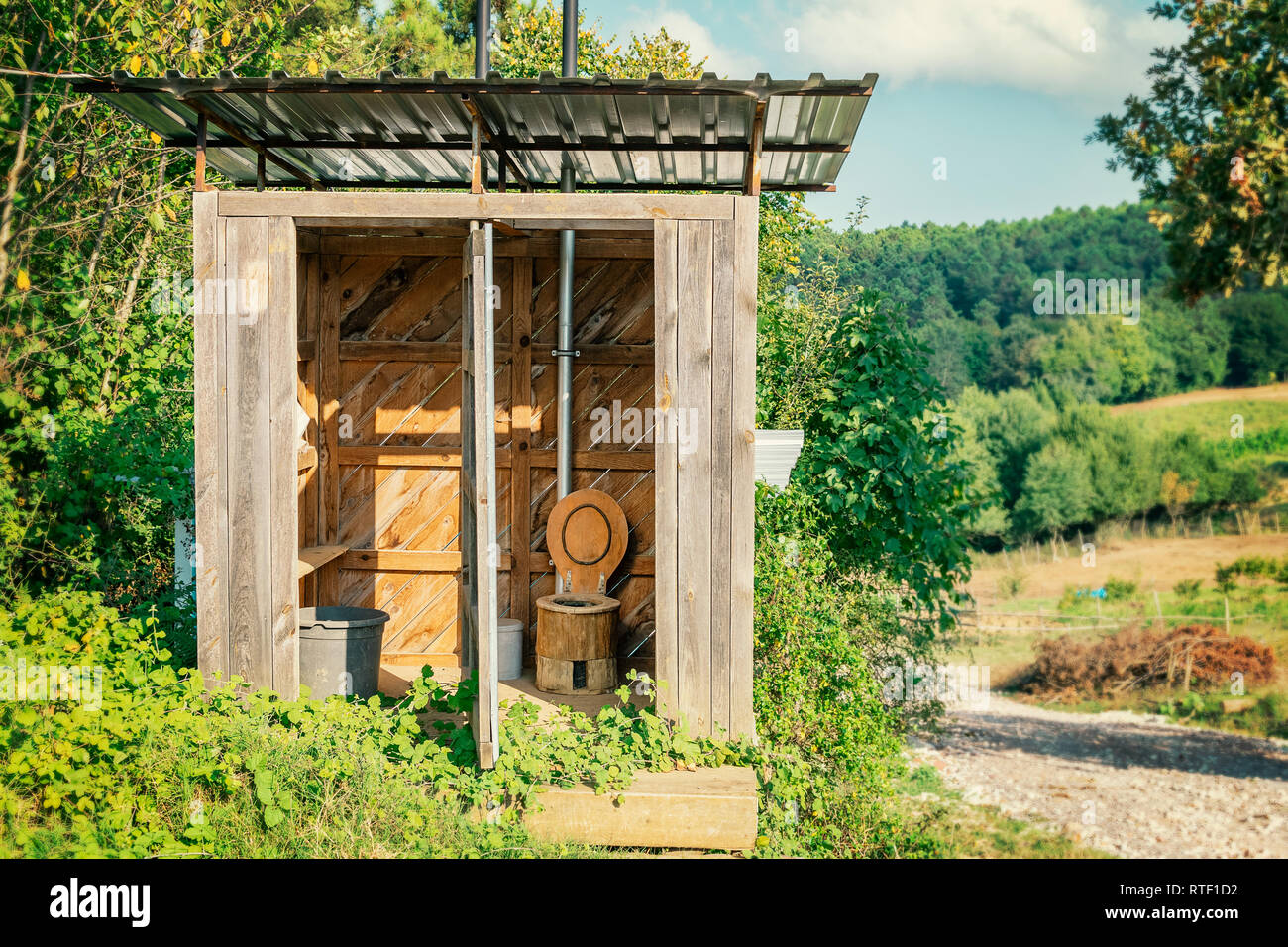 Wooden shed ecological composting toilet on countryside eco farm Concept image Stock Photo Alamy