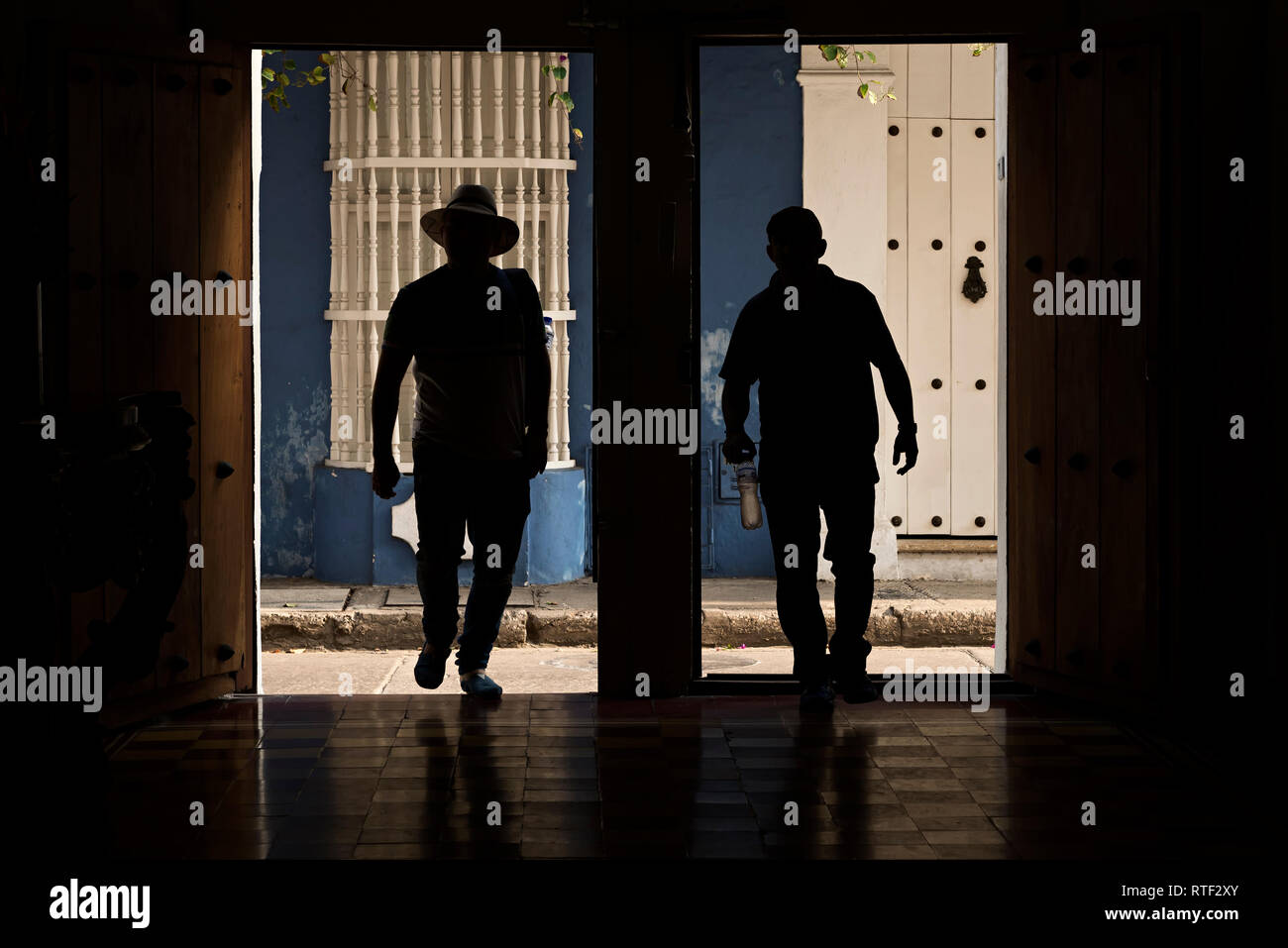 People walking through doors in hi-res stock photography and images - Alamy