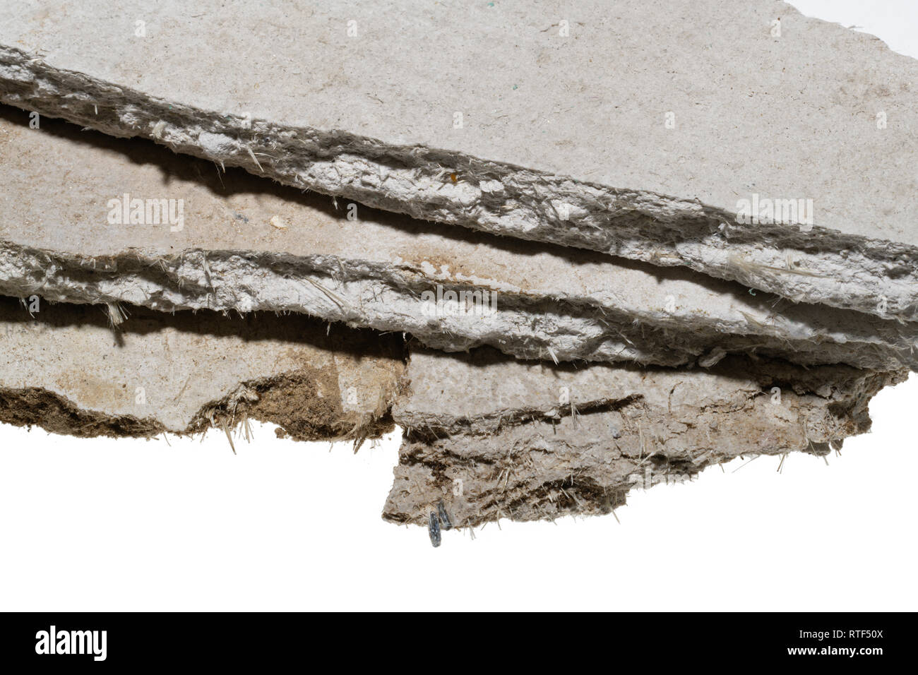 Asbestos sheets. Old building material with dangerous fibres. Low grade risk. Asbestos cement board Stock Photo