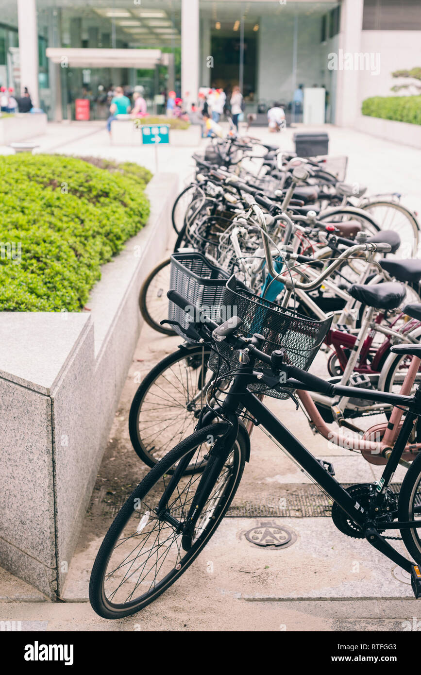 a row of bikes in Japan Stock Photo - Alamy