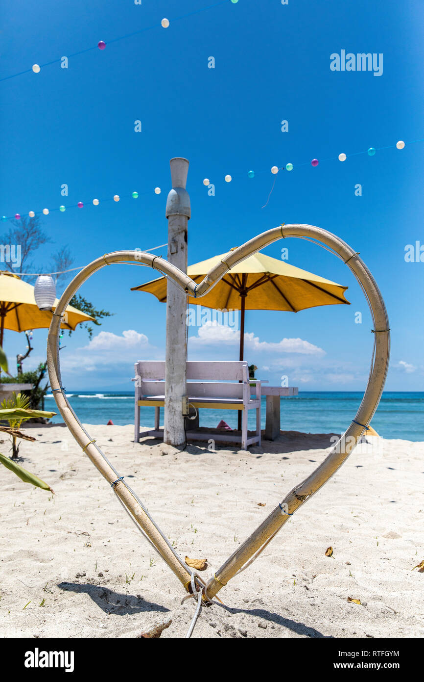 Colorful sunbeds on the beach of Gili Trawangan island, Indonesia. Stock Photo