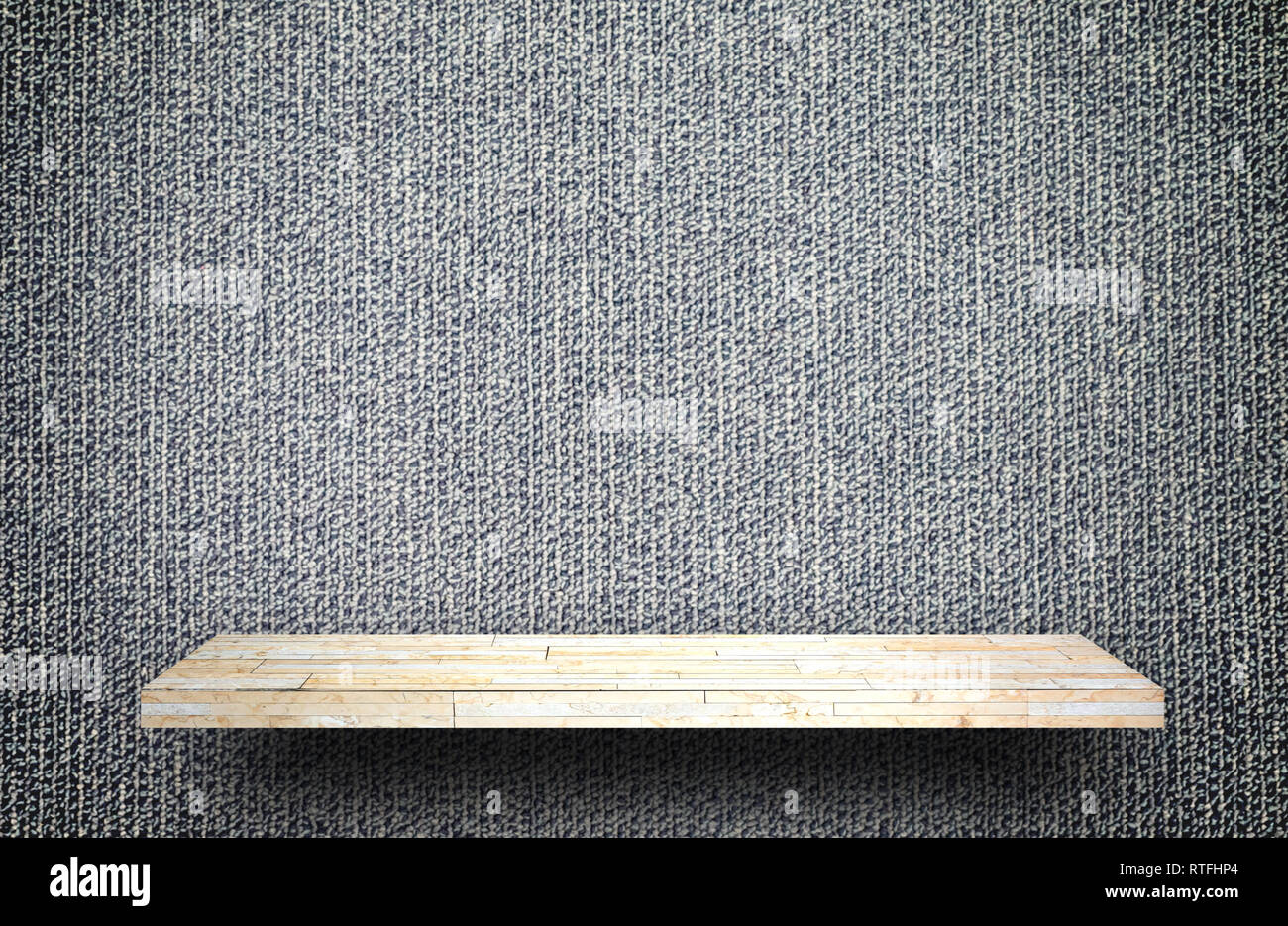 Empty rock stone shelf on gray carpet background Stock Photo