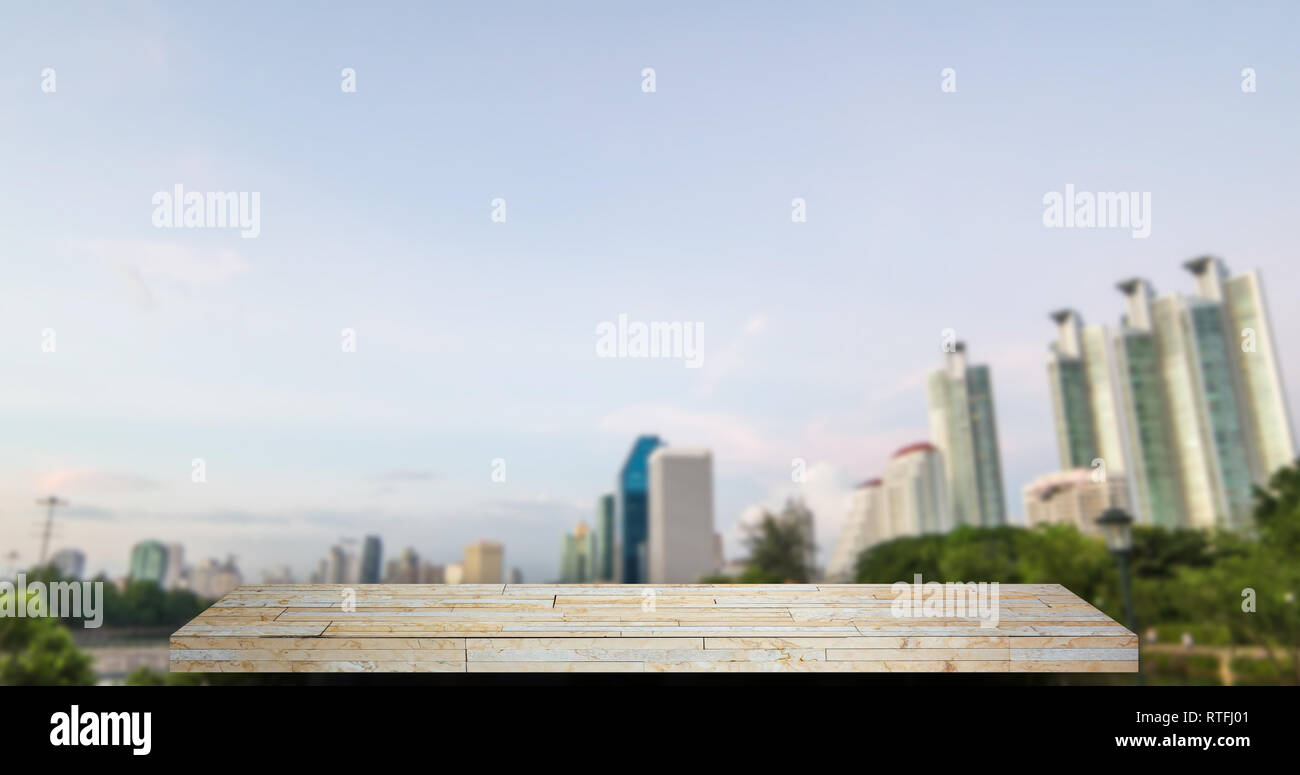 Empty brown rock stone shelf with City background Stock Photo