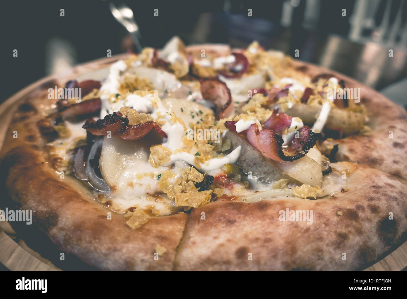 Pizza with potatoes and bacon from korean pizza champion Stock Photo Alamy