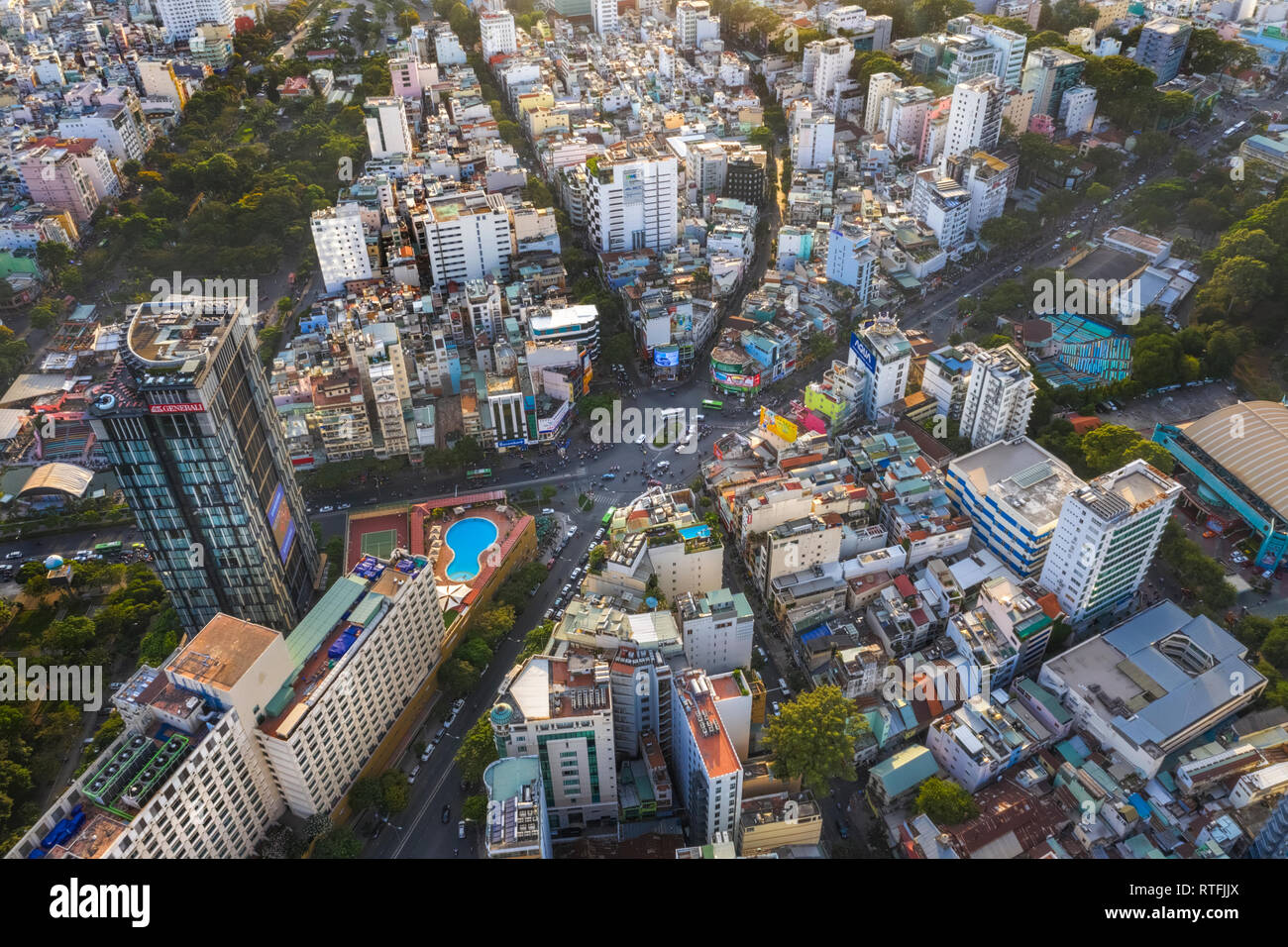 Top view aerial of Dan Chu roundabout or ' Nga Sau Dan Chu ', Ho Chi Minh City, Viet Nam with development buildings, transportation Stock Photo