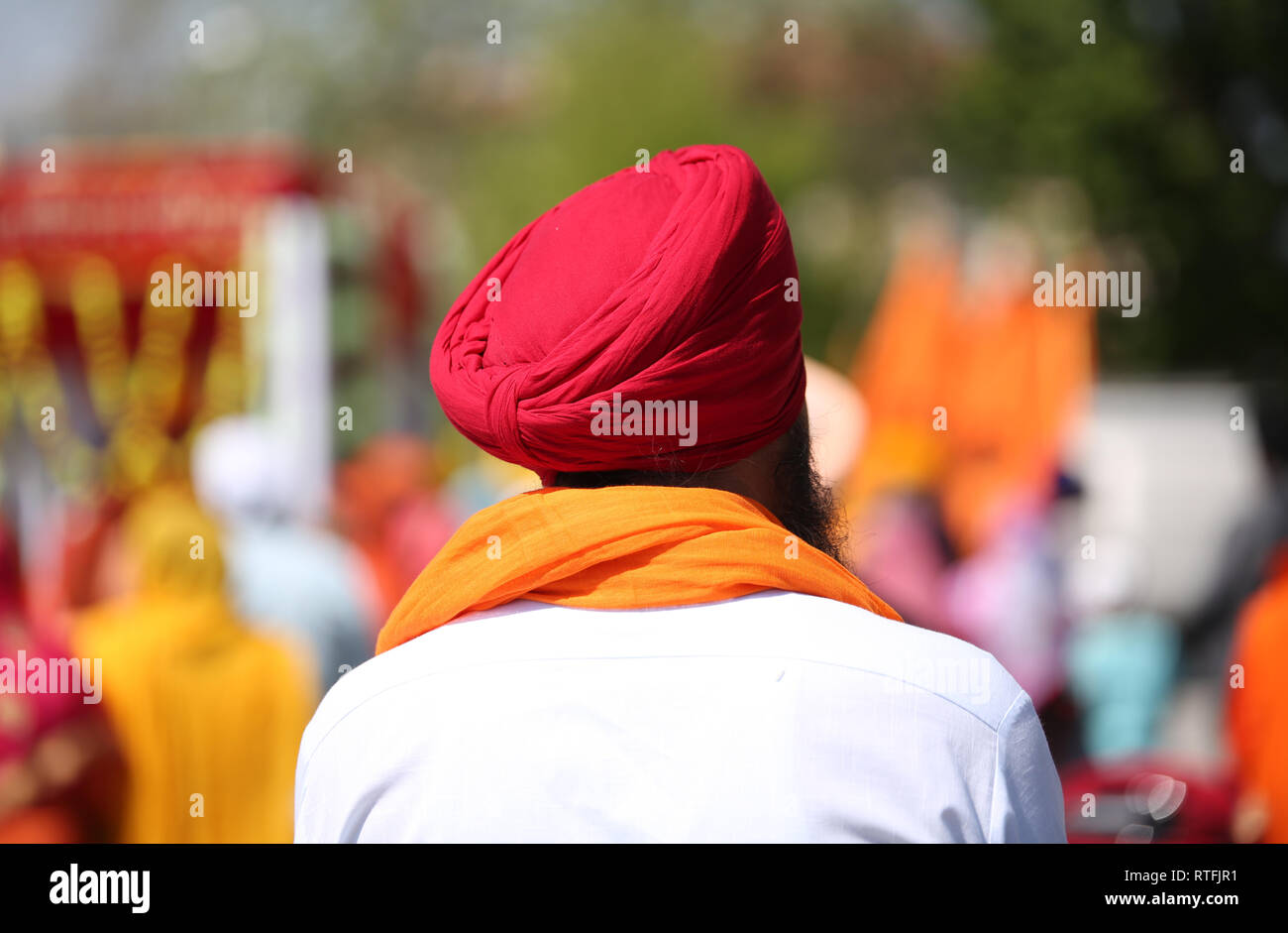 indian man with red turban and white shirt Stock Photo