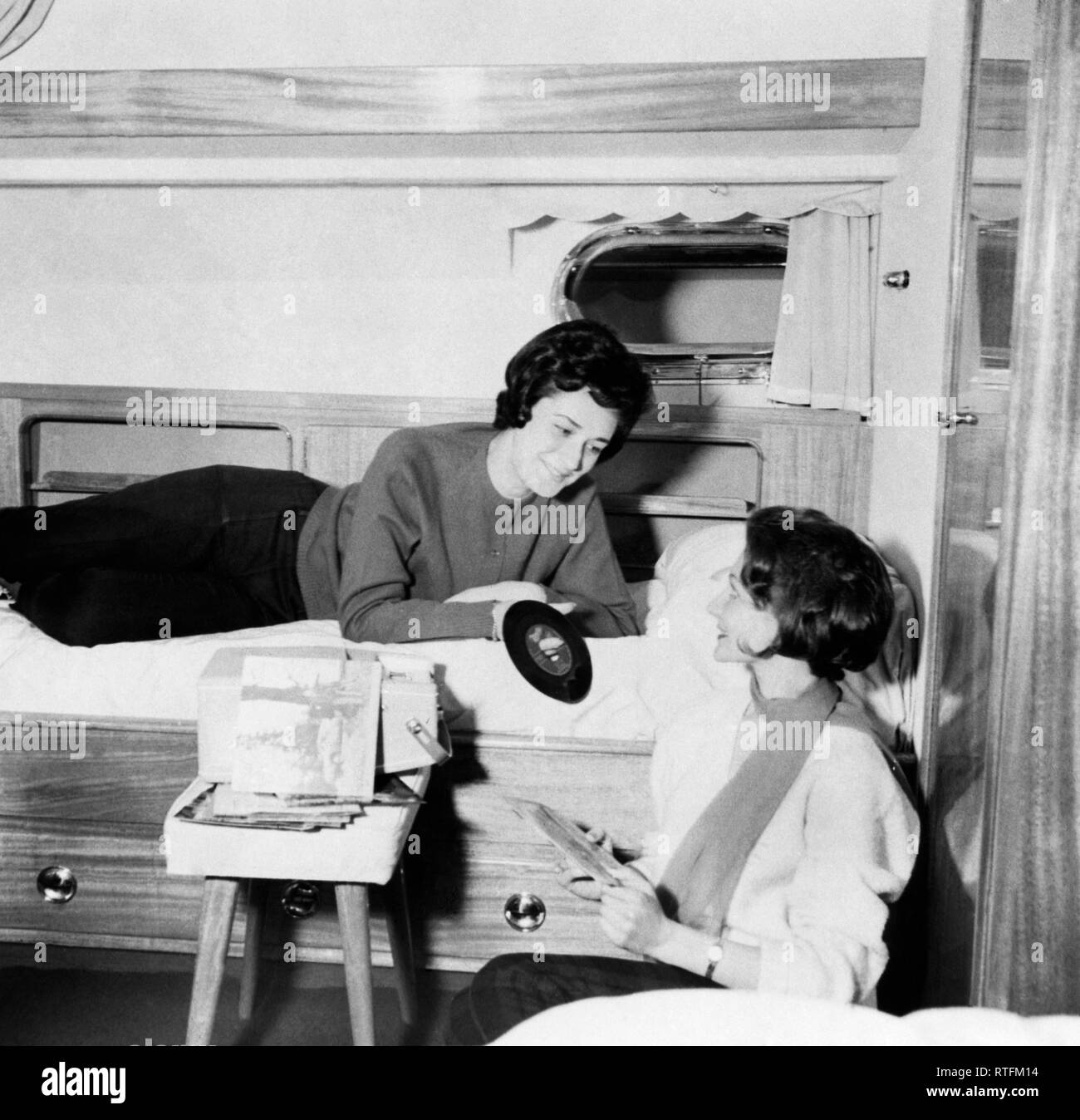 tourists in a cabin, motoryacht, ischia, 1961 Stock Photo