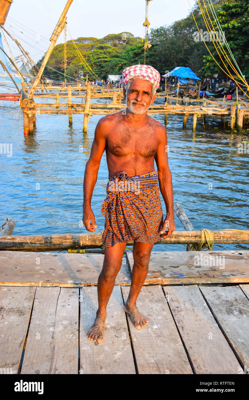 Indian Fisherman, Chinese Fishing Nets, Kochi, Cochin, Kerala, India Stock Photo