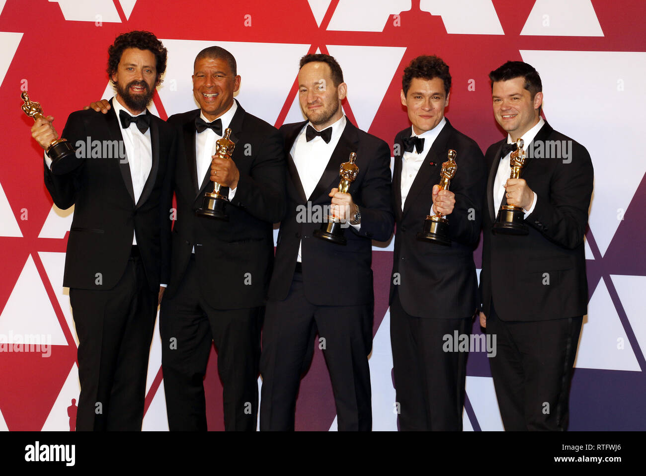 Bob Persichetti, Peter Ramsey, Rodney Rothman, Phil Lord and Christopher Miller at the 91st Annual Academy Awards - Press Room held at the Loews Hotel Stock Photo