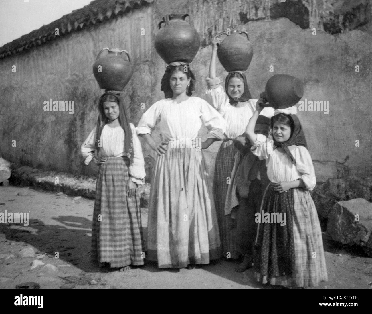 italy, sardegna, water bearers Stock Photo