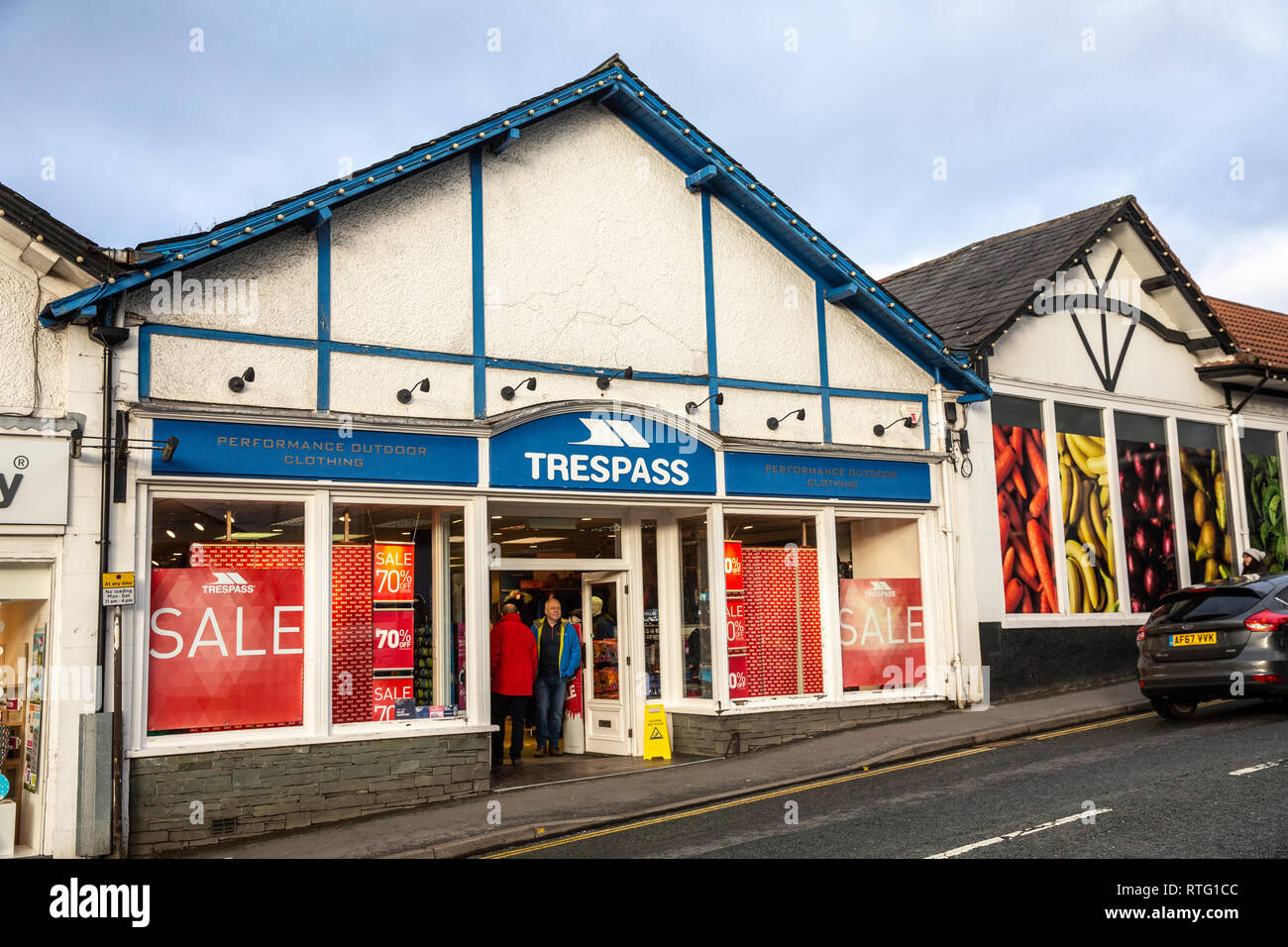 Trespass outdoor clothing store with january sales promoted, Bowness on Windermere in the Lake District,Cumbria,England Stock Photo