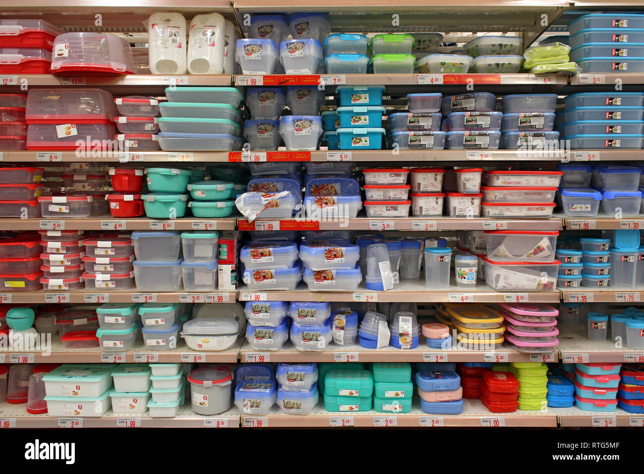 Stack of food tuppers plastic containers displayed on a supermarket Stock Photo