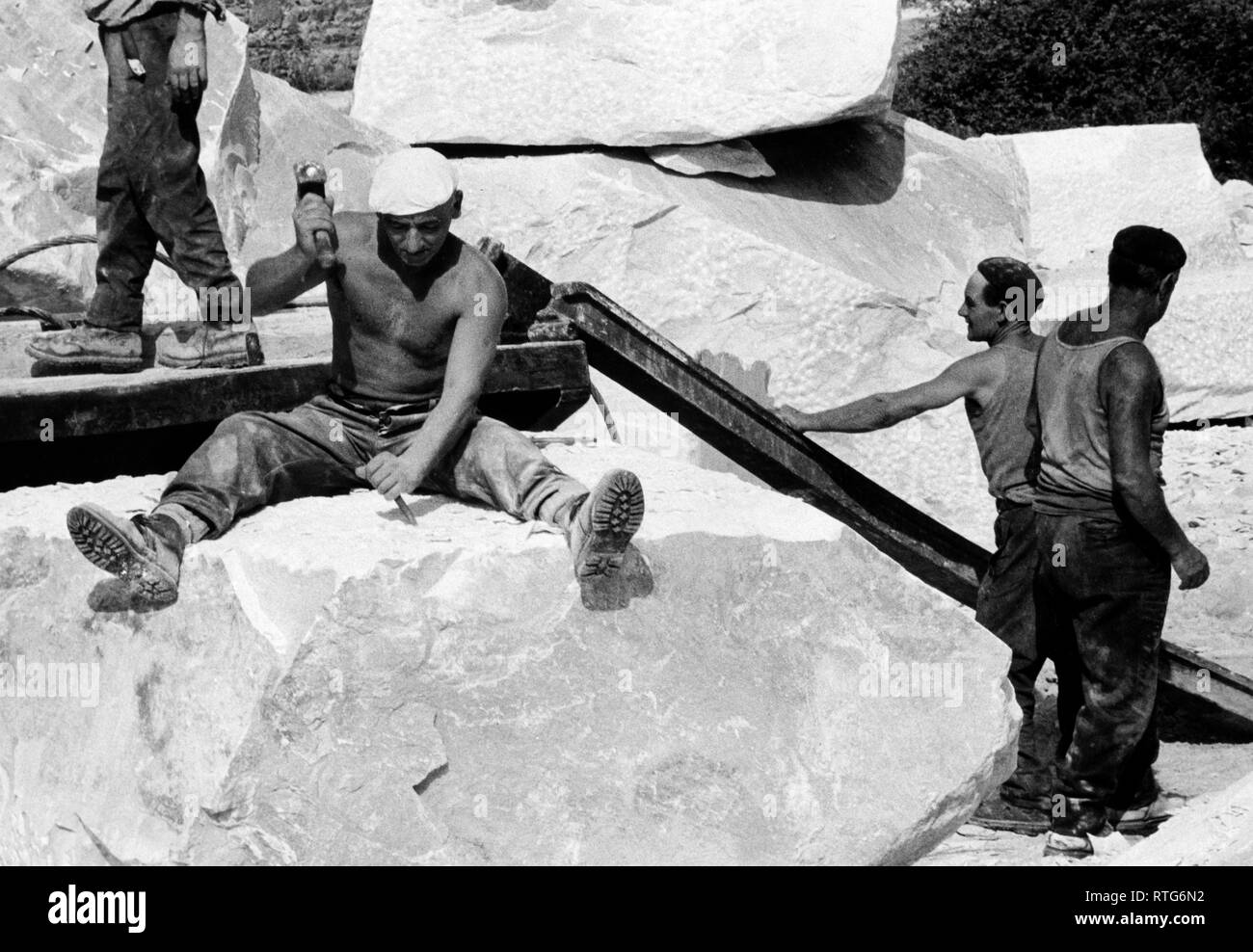 italy, tuscany, carrara, work in a marble quarry, 1965 Stock Photo
