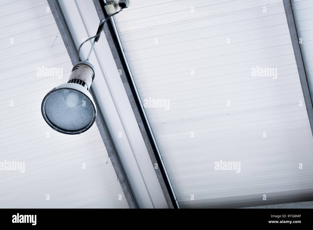 Factory white ceiling and industrial big lamp, workshop, warehouse roof  Stock Photo - Alamy
