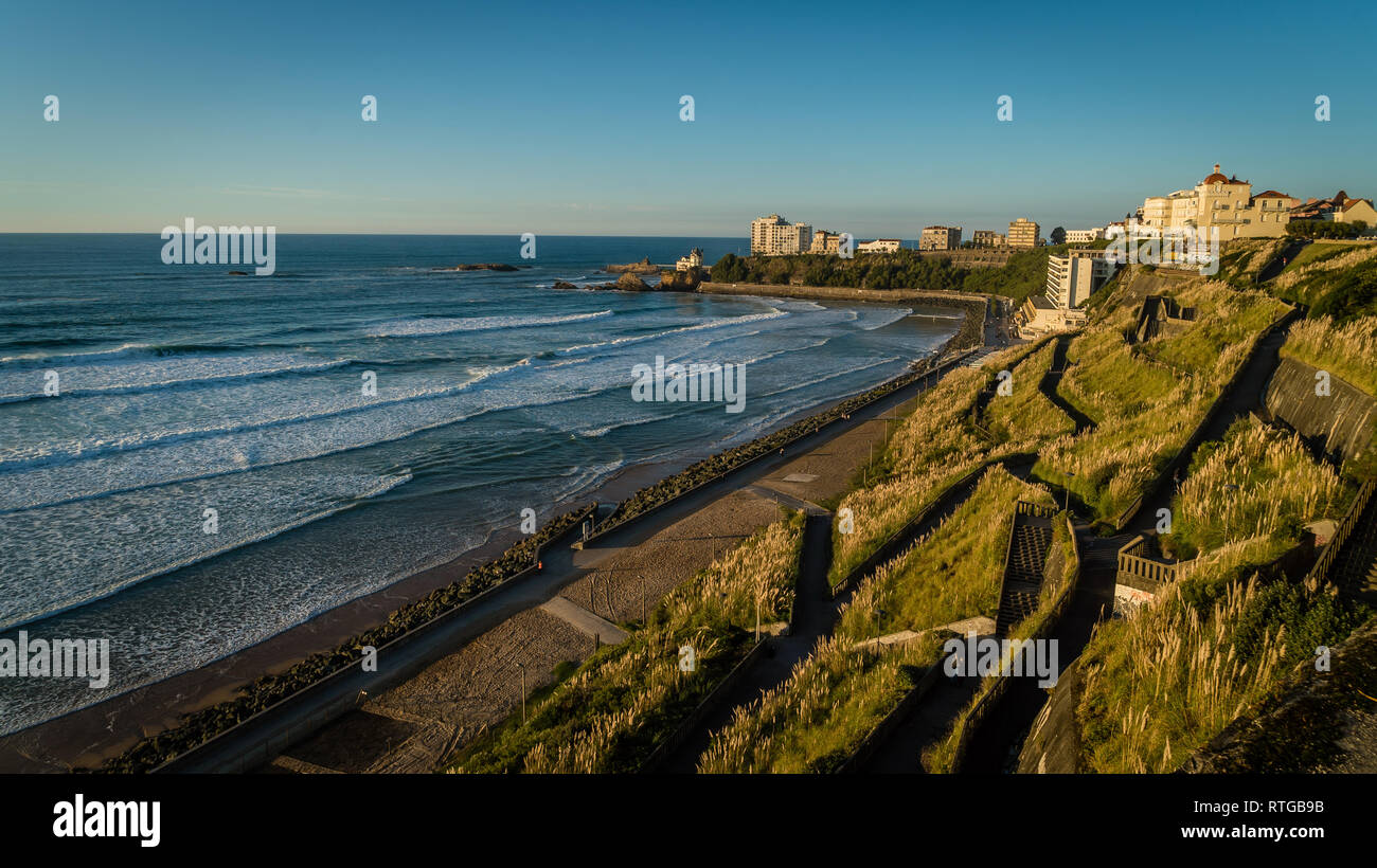 Biarritz beach and waves in fall during sunset Stock Photo