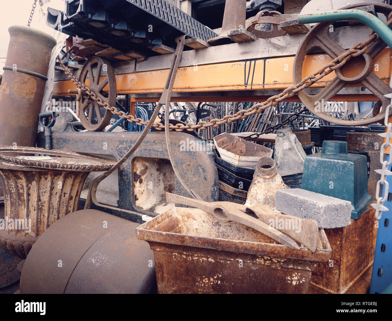 A collection of various guttering and garden hardware at a salvage yard