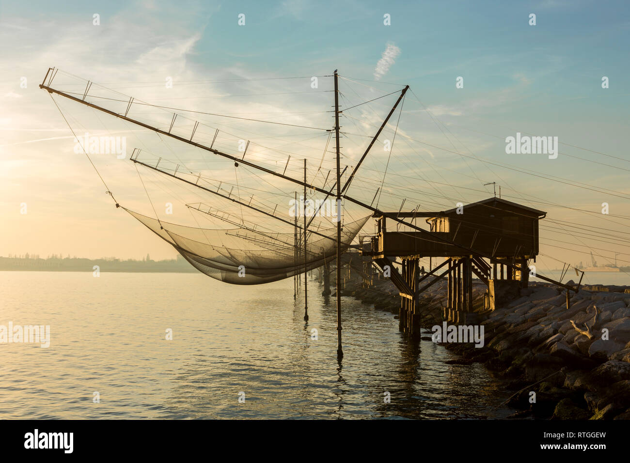 Trabucchi, old fishing platforms jutting out into the sea, from where two long arms stretch out suspended above the water and supporting a huge net Stock Photo