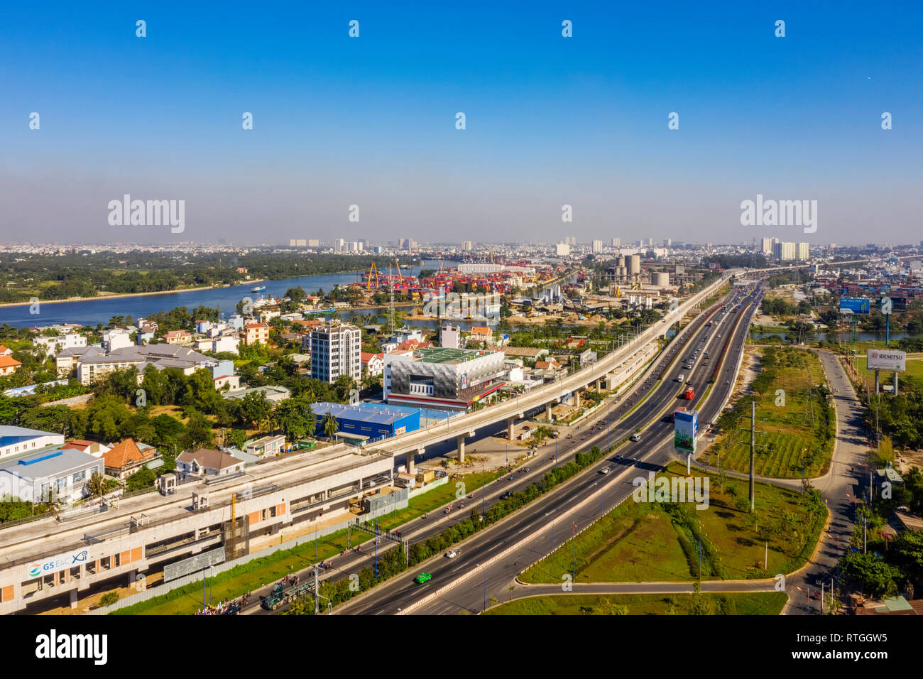 Top view aerial of Ha Noi highway view from district 2 to district 9, Ho Chi Minh City with development buildings, transportation, infrastructure, Vie Stock Photo
