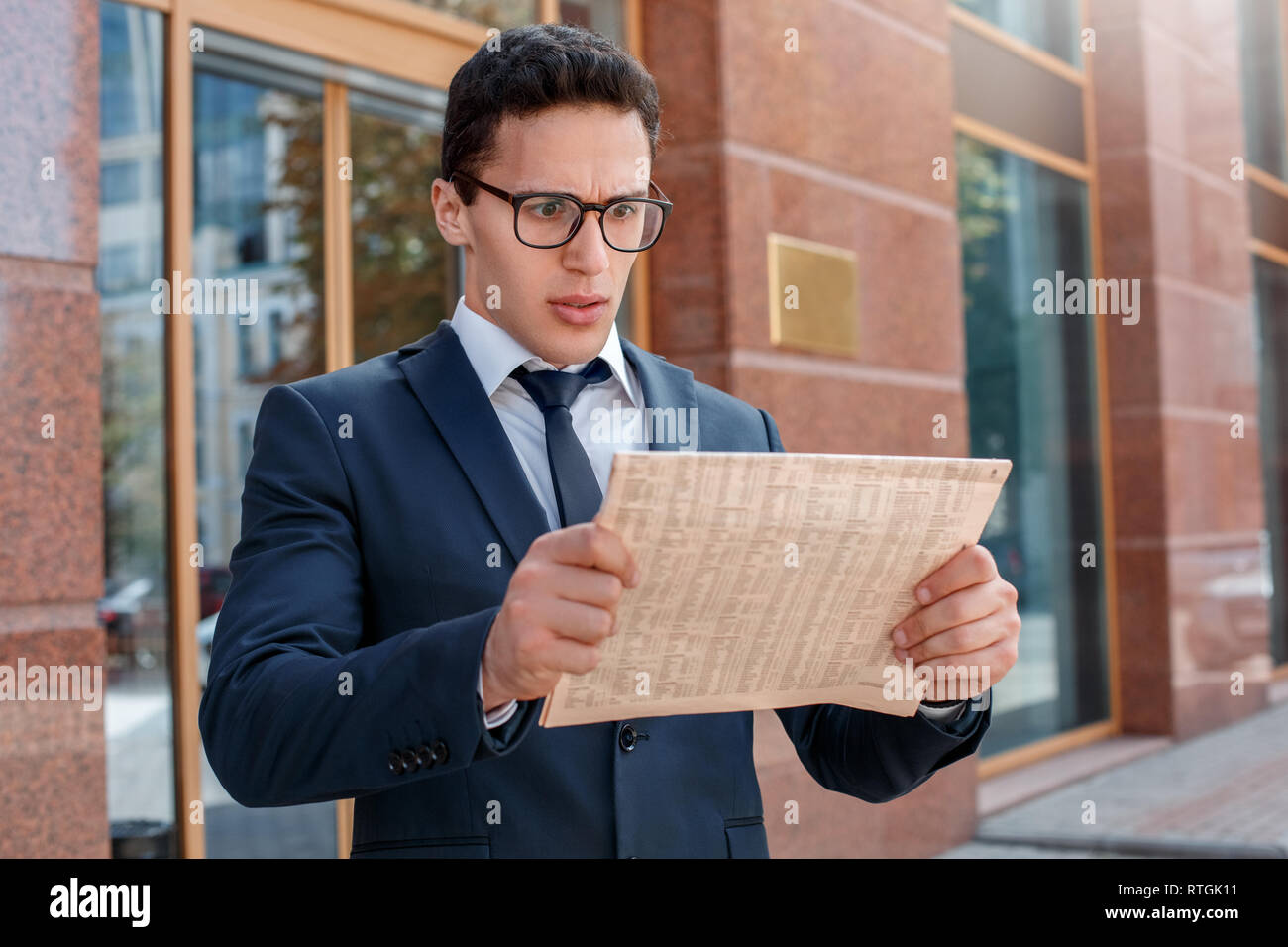 Shocked male in elegant suit hi-res stock photography and images - Alamy