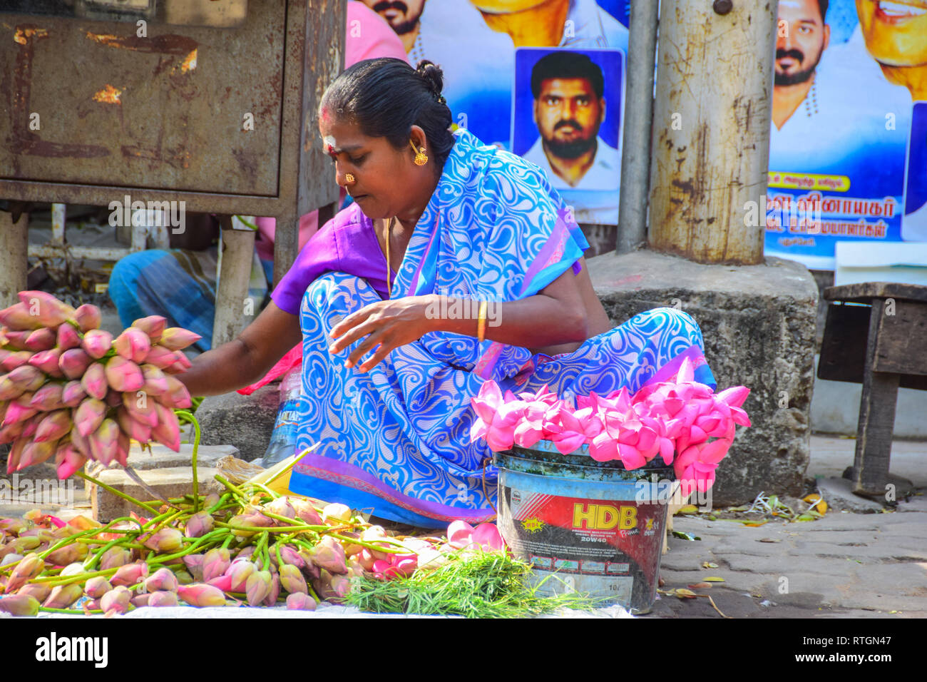 Flower Seller sitting outside Hindu temple, Pondicherry, Puducherry
