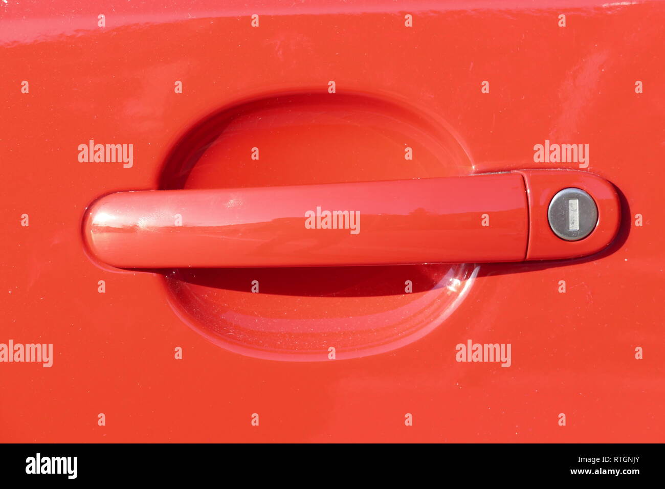 Red door lock on a red car Stock Photo Alamy
