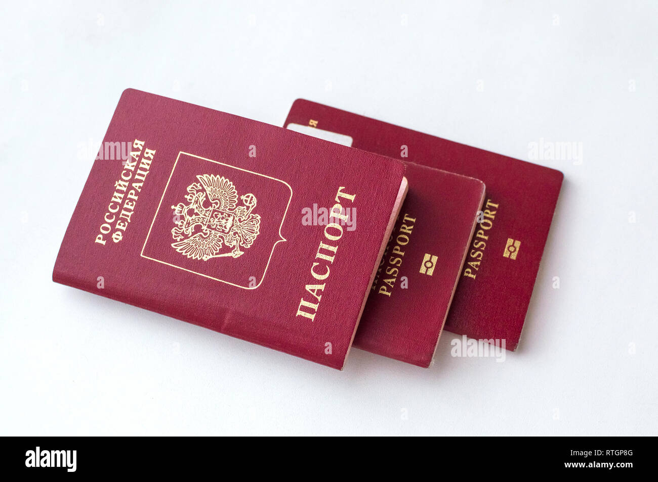 Three Passport Of The Citizen Of The Russian Federation On A White