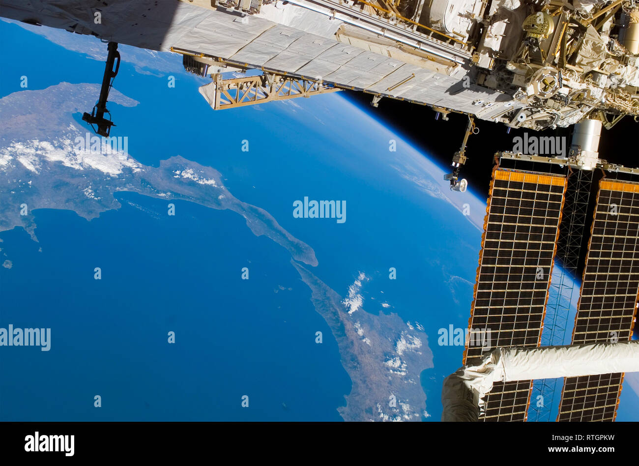 The International Space Station frames this view of thand the boot of Italy plus Siciily Stock Photo