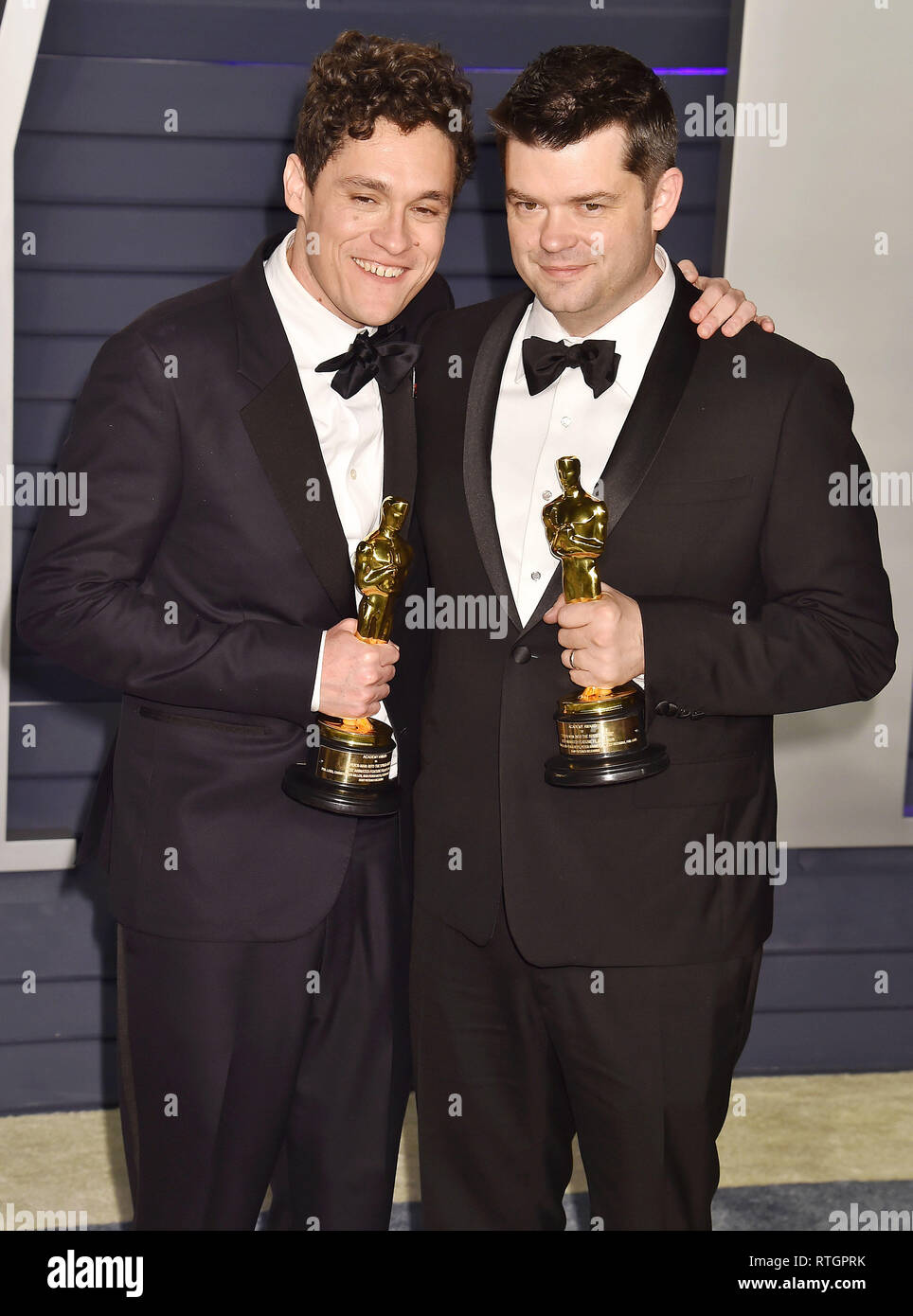 BEVERLY HILLS, CA - FEBRUARY 25: Best Animated Feature Film winners for 'Spider-Man: Into the Spider-Verse' (L-R) Phil Lord and Christopher Miller att Stock Photo