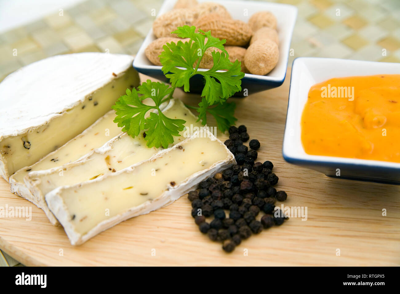healthy breakfast cheese, nuts, tomato sauce and tosted roll Stock