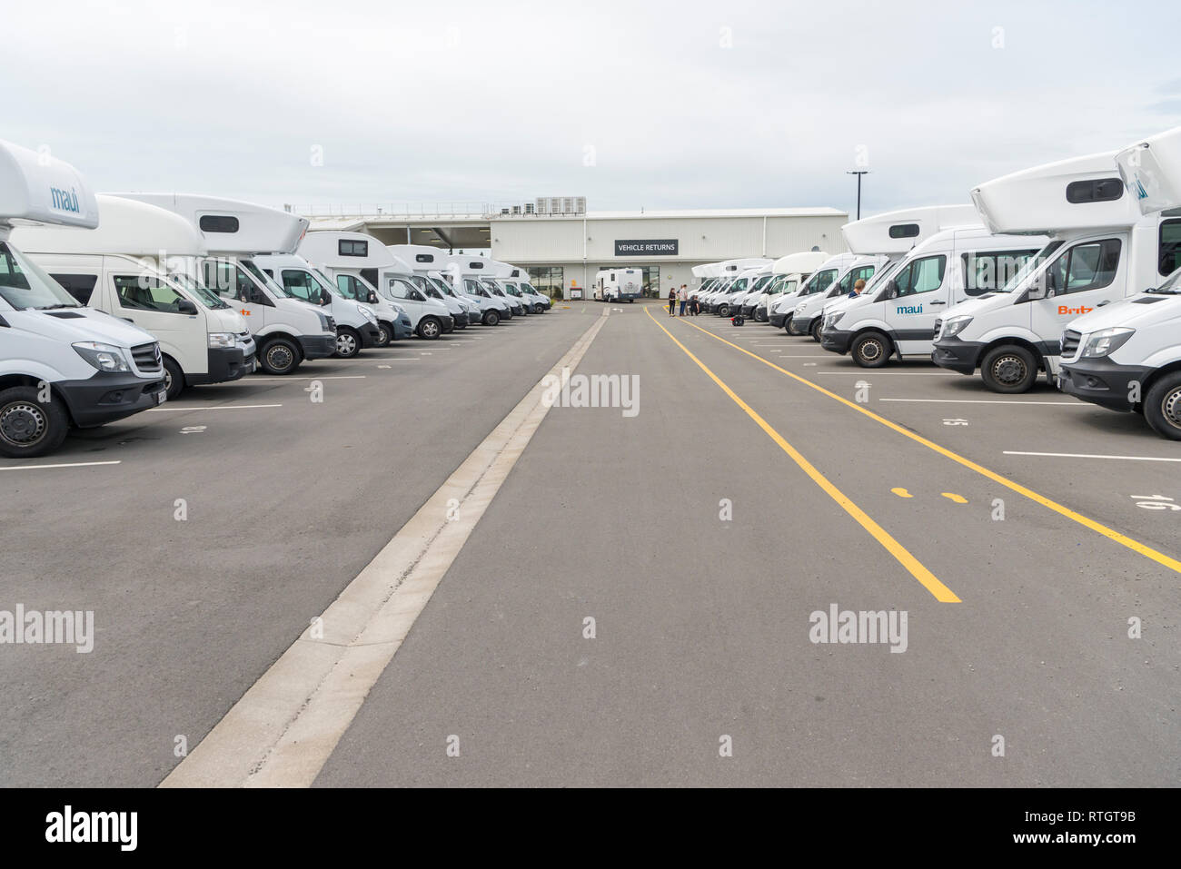 Motorhomes and campervans parked in a hire depot in Christchurch New