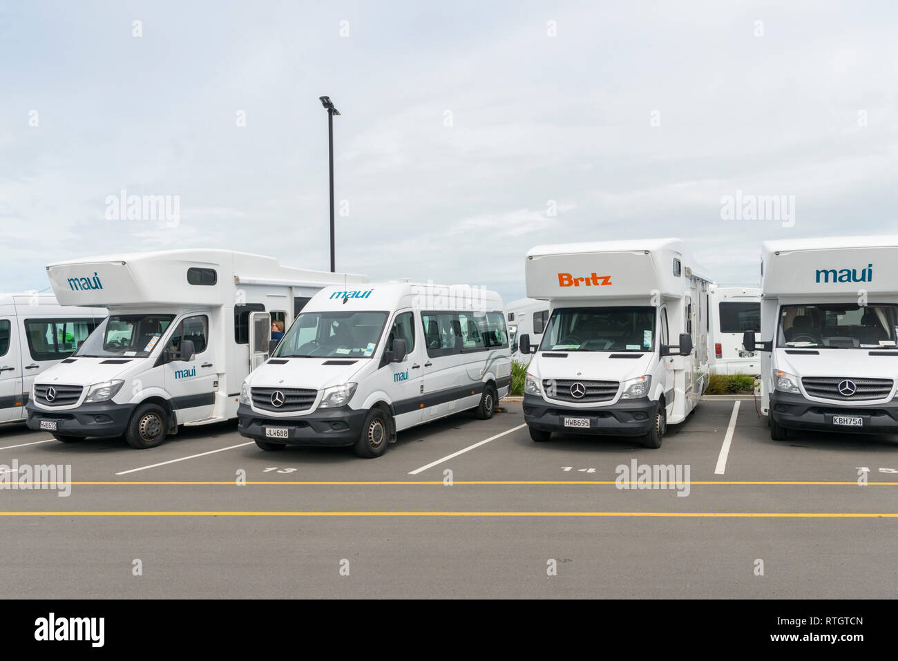 Motorhomes and campervans parked in a hire depot in Christchurch New