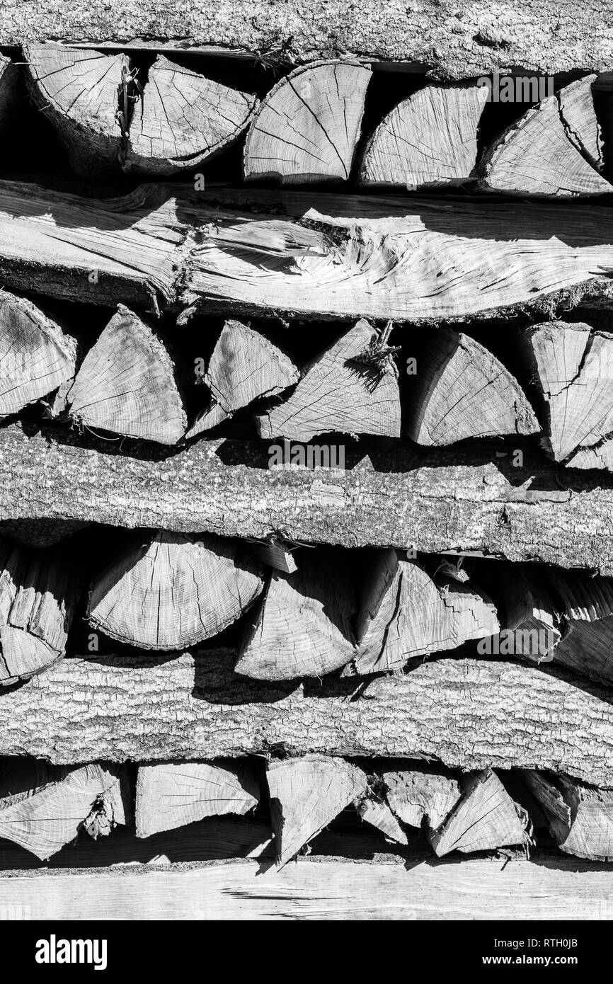 Stacked firewood during winter time for household use in Lower Austria Stock Photo