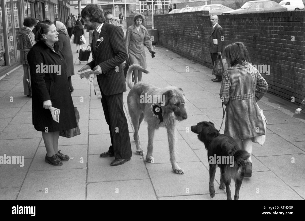 Politician electioneering with dog. Prospective MP SNP Scottish National Party Alex Ewing campaigning with his pet Wolf Hound 1979 Cathcart Glasgow. 1970s. He did not win and came third to labour and then Conservative. HOMER SYKES Stock Photo