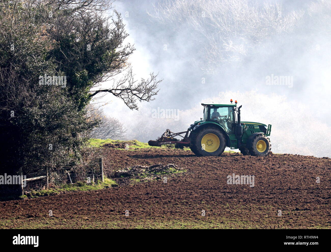 Tractor on Farm Stock Photo
