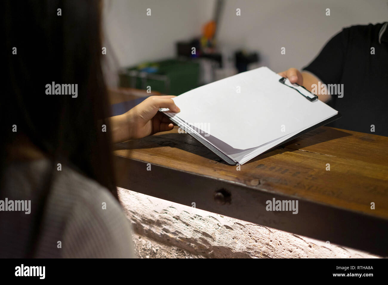 Receptionist's sent the documents to guest for signing and filling up