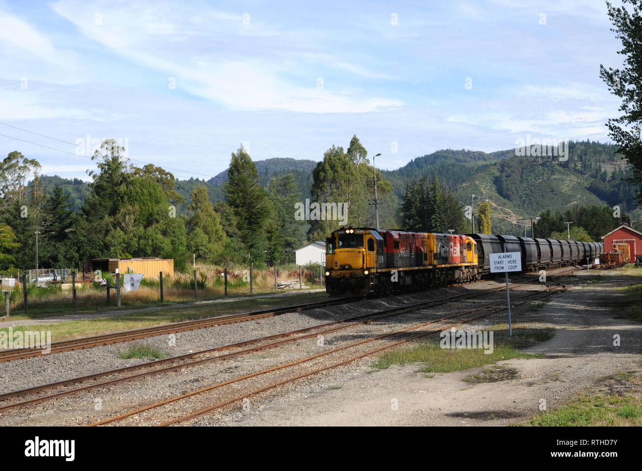 Kiwi Rail locomotive at Reefton on New Zealands South Island. The locomotives on this line are used to haul coal. Stock Photo