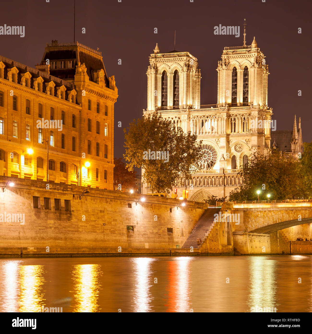 Seine river and Notre Dame de Paris at night, France Stock Photo