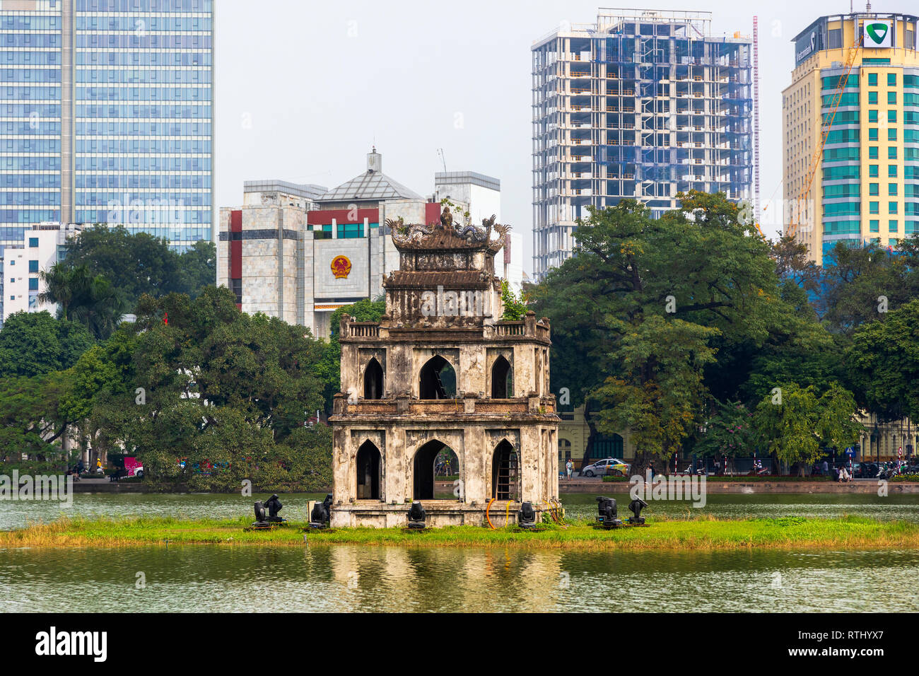 At the northern end of Hoan Kiem Lakeis an islet on which stands a small tower called Thap Rua (Turtle Tower). This structure honours the magic turtle Stock Photo