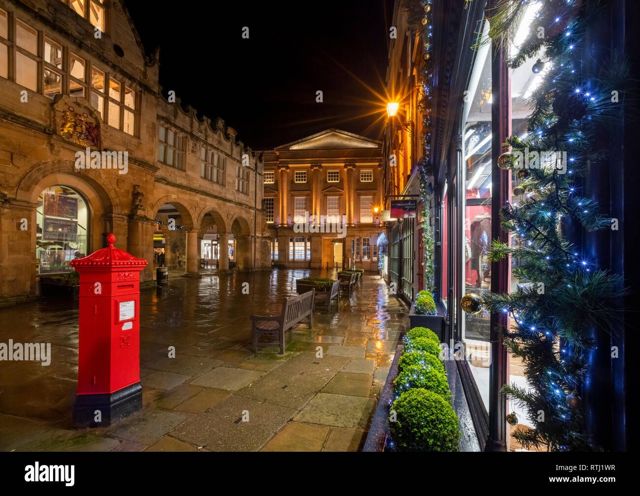 Reflections in the rain in the Square, Shrewsbury, Shropshire. Stock Photo