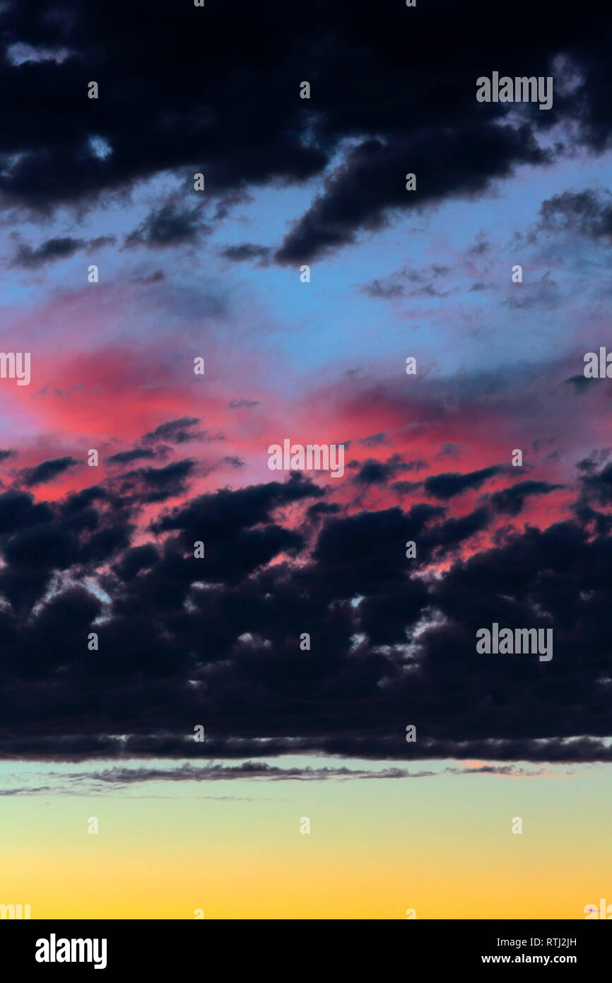 Clouds on sunset sky, background Stock Photo - Alamy